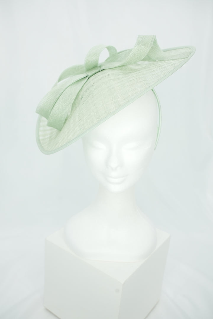Fascinator rund mit Schleife hellgrün/mint