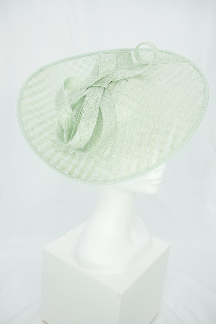 Fascinator rund mit Schleife hellgrün/mint