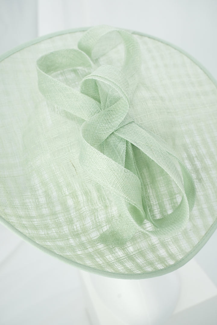 Fascinator rund mit Schleife hellgrün/mint