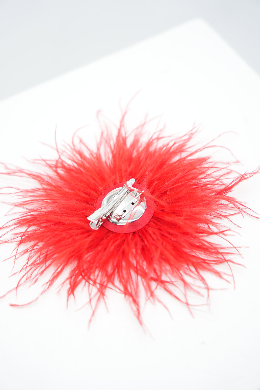 Feder-Spange rot