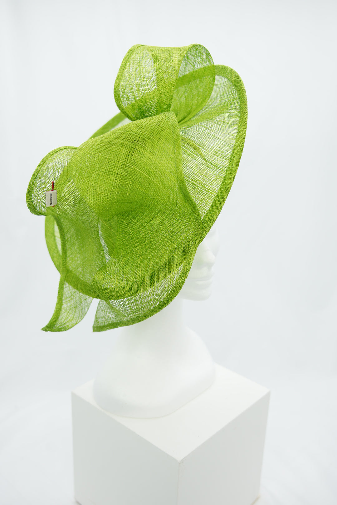 Fascinator "Sinemay" grün